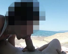 Girl sucks cock at public beach and gets caught by stranger