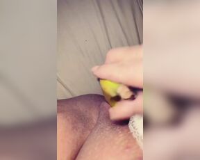 Swiss girl fucks herself with a banana