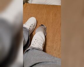 Rubbing his cock with white shoes