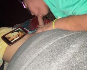 Watching porn and sucking his dick