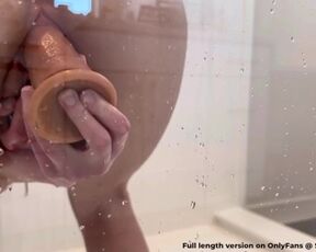 Masturbating with my clear dildo on the shower door ????