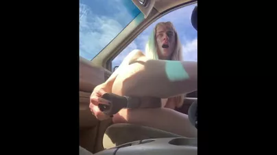 Whore Fucks Herself in Her Car with Huge Cock