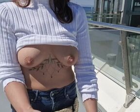 I walk around the city and flash my breasts in public