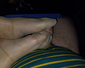 my wife in the car at a meeting in stockings makes a footjob